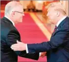  ?? ALEX EDELMAN/AFP ?? US President Donald Trump shakes hands with Australian Prime Minister Scott Morrison in the East Room of the White House in Washington, DC during a state visit.