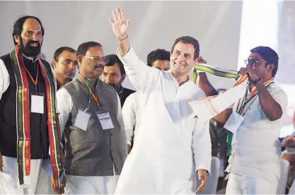  ?? Agence France-presse ?? Rahul Gandhi waves people at a public meeting for the campaign of the 2018 Telangana state Assembly elections at Medchal constituen­cy.