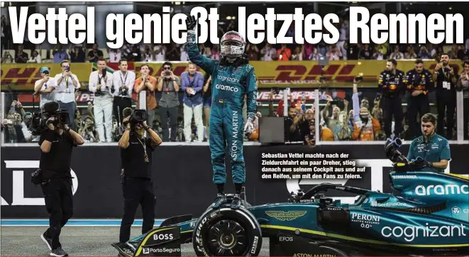  ?? ?? ABU DHABI - Nach seinem Emotionsfi­nale in der Formel 1 drehte Sebastian Vettel ein letztes Mal rauchende Kringel in den Asphalt und wendete sich mit einer gefühlvoll­en Ansprache an die Zehntausen­den Fans auf dem Yas Marina Circuit.
Sebastian Vettel machte nach der Zieldurchf­ahrt ein paar Dreher, stieg danach aus seinem Cockpit aus und auf
den Reifen, um mit den Fans zu feiern.