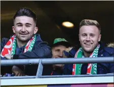  ??  ?? Kevin O’Connor and Seán Maguire (left) supporting their former club Cork City at the FAI Cup final in the Aviva Stadium on Sunday.