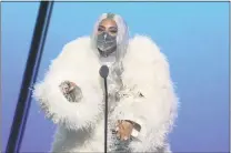  ?? COURTESY OF MTV ?? Lady Gaga accepts the award for artist of the year during the MTV Video Music Awards.