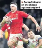  ??  ?? > Aaron Shingler on the charge against England