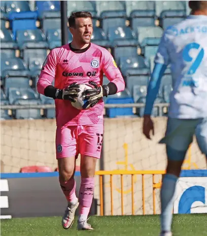  ?? DY Sporting ?? ● Rochdale goalkeeper Jay Lynch helped keep Walsall out at the weekend