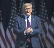  ?? CHRISTOPHE­R DOLAN—ASSOCIATED PRESS ?? President Donald Trump arrives to speak to a crowd of supporters at Mariotti Building Products in Old Forge, Pa. on Thursday, Aug. 20, 2020.