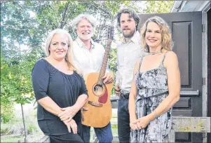  ?? SALLY COLE/THE GUARDIAN ?? Performers in “Ireland Meets Scotland” enjoy a break outside the hall at Orwell Corner Historic Village after a sound check. From left are Laurie Murphy, special guest, Kevin Jeffrey, guitar and vocals, Colin Jeffrey, fiddle, and Amanda Mark, flute, tin whistle and bass. The show continues Fridays until Aug. 25.