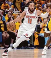  ?? Michael Conroy/Associated Press ?? Knicks guard Jalen Brunson drives during the first half of Game 3 of their second-round playoff series on Friday.