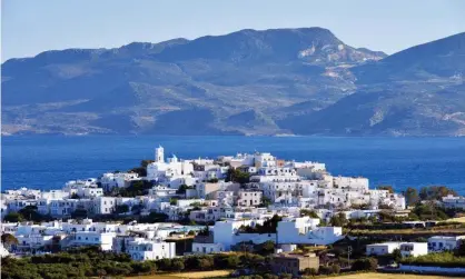  ??  ?? The Tui-run Mein Schiff 6 is moored off the Aegean island of Milos. Photograph: Alamy