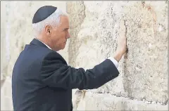  ?? RONEN ZVULUN — THE ASSOCIATED PRESS ?? Vice President Mike Pence touches the Western Wall, Judaism’s holiest prayer site, in Jerusalem’s Old City on Tuesday.