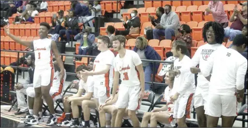  ?? Photos by Gerren Smith ?? The hometown Malvern Leopards showing their excitement during game action at the Leopard Center during the 2021-2022 basketball season—led by head coach Jess Martin with assistant coaches Justin Delamar and John Strange.