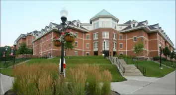  ?? California University of Pennsylvan­ia ?? At California University of Pennsylvan­ia, students who requested roommates can live together as family units at residence halls like this one on campus, said Christine Kindl, vice president for communicat­ions and public relations. Many of those who didn’t request a roommate will be in a single room for social distancing.