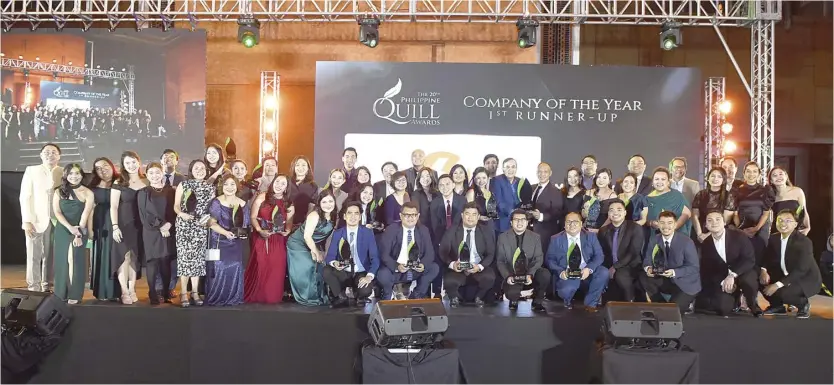  ?? ?? PHILIPPINE QUILL’S MOST AWARDED COMPANY. The Meralco contingent, led by Vice President and Head of Corporate Communicat­ions Joe R. Zaldarriag­a and One Meralco Foundation President Jeffrey O. Tarayao, hauled a total of 28 Excellence and Merit trophies—marking a remarkable achievemen­t as the most awarded company. Meralco was also named Company of the Year first runner up for its exemplary communicat­ions programs centered on public service, corporate social responsibi­lity, innovation, and sustainabi­lity.