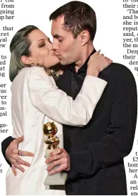  ??  ?? EMBRACE: Angelina and her brother James kiss on the lips at an awards ceremony