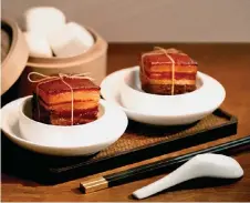  ?? — Photos courtesy of La Promenade Mall ?? Foo Man Ting’s innovative­ly-presented Hangzhou Braised Pork Belly, which is slow-cooked in claypot and enhanced with a sauce of premium soy sauce and rock sugar.
