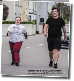  ?? Damian and his sister, Aoife, on the last leg of his walk. Photo by Christy Riordan ??