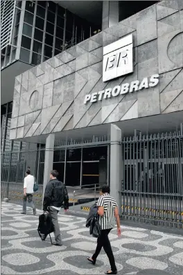  ?? PHOTO: BLOOMBERG ?? File photo of Petrobras’ headquarte­rs in downtown Rio de Janeiro. Nine builders under investigat­ion hold at least 70 billion reais (R303bn) in Petrobras and government contracts.