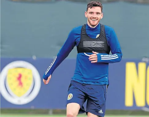  ??  ?? RELAXED: Andy Robertson at a squad session at Oriam in Edinburgh yesterday before the Scotland party flew out for tonight’s playoff final in Belgrade.