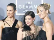  ?? AP PHOTO/MATT SAYLES, FILE ?? In this 2007 file photo, the Dixie Chicks, Emily Robison, left, Natalie Maines, center, and Martie Maguire arrive for the 49th Annual Grammy Awards in Los Angeles.