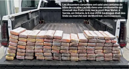  ?? PHOTO D’ARCHIVES ?? Les douaniers canadiens ont saisi une centaine de kilos de cocaïne cachés dans une camionnett­e qui revenait des États-unis, sur le pont Blue Water, à Sarnia, en Ontario, le 6 mai 2014. La drogue était destinée au marché noir de Montréal.