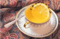  ??  ?? An Alpine Toddy blends the milder, sweeter yellow variation of Chartreuse liqueur with citrus and chamomile tea.