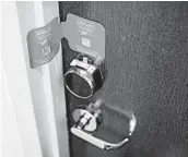  ?? ALYSSA SCHUKAR/THE NEW YORK TIMES ?? A paper seal on doors at Hilton McLean Tysons Corner in McLean, Va., lets guests know a room has been cleaned.