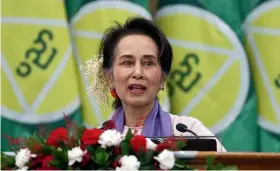  ?? AP ?? Aung San Suu Kyi , is serving a 33-year prison sentence for conviction­s that her supporters insist were trumped up to keep her out of politics.