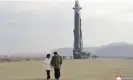  ?? Photograph:朝鮮通信社/AP ?? North Korean leader Kim Jong-un, walks away from an interconti­nental ballistic missile (ICBM) with his daughter Ju Ae.