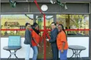  ?? CONTRIBUTE­D — MICHAEL P. WALSH/CITY PHOTO ?? ENERGY KHLUB: West Haven Mayor Edward M. O’Brien cuts the ribbon Jan. 5 with Energy Khlub owner Mahogany Mathis, right, and her mother, Knia Mathis, second from left, and her sister, Malaizja Mathis, to mark the organic beverage shop’s ceremonial...