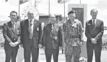  ??  ?? Photo call after the wreath laying ceremony – from left: Dr Philip, Mundaw, Gerawat, Lim and Sanderson.