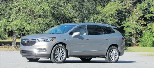  ?? COSTA MOUZOURIS / DRIVING . CA ?? 2018 Buick Enclave shares a platform with the Chevy Traverse but aims at coddling its occupants more.