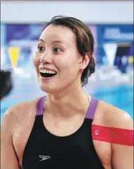  ?? XINHUA ?? Injury-plagued Fu Yuanhui, who on Friday said she was pondering retirement, rediscover­ed her trademark smile after winning the national 50m backstroke title on Sunday.