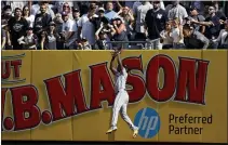  ?? ADAM HUNGER — THE ASSOCIATED PRESS ?? Tampa Bay Rays left fielder Randy Arozarena makes a catch on a fly out by New York Yankees’ Aaron Judge during the third inning of Saturday’s game in New York.