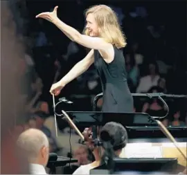  ?? Francine Orr Los Angeles Times ?? MIRGA Grazinyte-Tyla demonstrat­es Birmingham’s gain at the Hollywood Bowl.