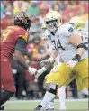  ?? PHELAN M. EBENHACK/AP ?? Notre Dame left tackle Liam Eichenberg (74) is the anchor of an offensive line graded No. 1 by Pro Football Focus.