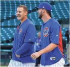  ?? JIM YOUNG/USA TODAY ?? Anthony Rizzo, left, and Kris Bryant are linked in Cubs lore and signed through 2021.