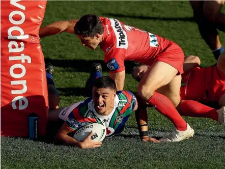  ??  ?? Warriors prop Jamayne Taunoa-Brown celebrates his first NRL try, against the Dragon last Saturday.