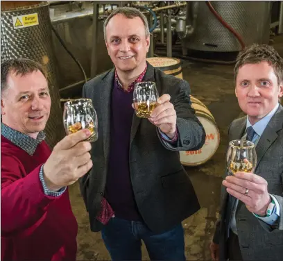  ??  ?? Liam Hughes, Mike Hayward and Ian McDougall, co-founders of The Glasgow Distillery Company, raise a glass