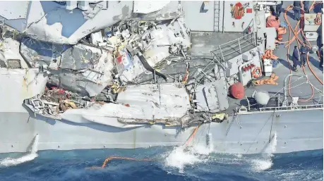  ?? IORI SAGISAWA, AP ?? Seven sailors died June 17 when the USS Fitzgerald, above, was hit by a cargo ship 60 miles off the coast of Japan. The Navy has blamed the collision on a loss of situation awareness by sailors on the bridge.