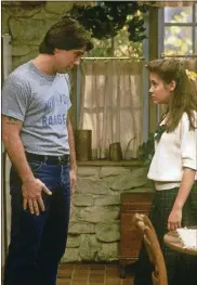  ?? SONY PICTURES TELEVISION VIA AP ?? This image provided by Sony Pictures Television shows Tony Danza, left, as Tony Micelli and Alyssa Milano as Samantha Micelli in a scene from “Who’s the Boss?” A sequel to the 1980s-’90s sitcom is in the works at Sony Pictures Television, with Danza and Milano set to reprise their father-daughter roles.