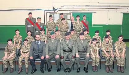  ??  ?? SAS: Who Dares Wins star Ant Middleton, third from left in the front row, pictured with cadets and guests.