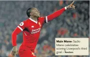  ?? /Reuters ?? Main Mane: Sadio Mane celebrates scoring Liverpool’s third goal.