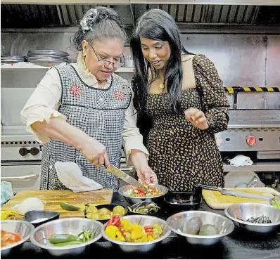  ?? FOOD IS ME ?? Maria Ojeda of Maria’s Tortas Jalisco cooks with Tara O’Brady, host of “Food Is Me” a docuseries being released on-demand on Bell Fibe TV1 this spring.