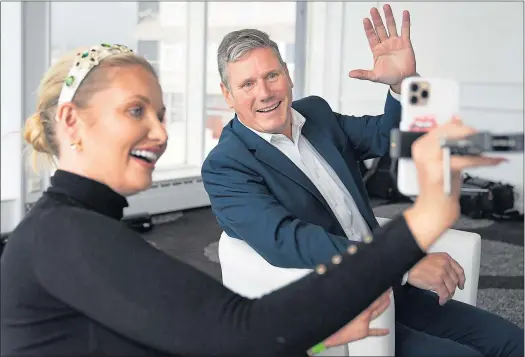  ?? Stefan Rousseau ?? Labour Party leader Keir Starmer with Love Island star Amy Hart for a Q&A with young people at the Hilton in Brighton yesterday
Picture