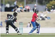  ?? GETTY IMAGES ?? Heather Knight cuts during her half-century for England against New Zealand in Nelson.