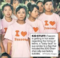  ?? AFP/Getty Images ?? KID STUFF: Foxconn is getting in hot water regarding the hiring of teens, a “baby face” issue similar to a flap that included this 2010 Shenzhen rally over factory suicides.