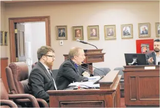  ?? MILLICENT MCKAY/JOURNAL PIONEER ?? Iain McCarvill, left, of Key Murray Law, and Summerside CAO Rob Philpott run through the city's new Access to Informatio­n and Protection of Personal Informatio­n bylaw with councillor­s during a recent Summerside City Council meeting.