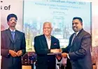  ??  ?? Dr. A. Dexter Fernando (DBA – Latin America, MBA – UK, BBA – India, MPM – USA, FAAPM – USA, MMC – USA) receive certificat­e from Special Assignment­s Minister Dr. Sarath Amunugama