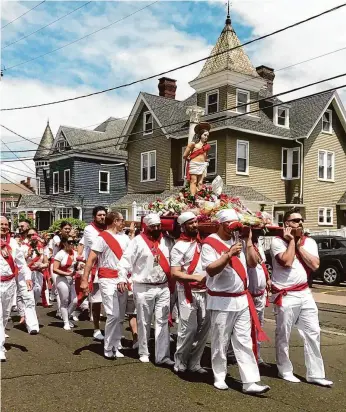  ?? Photos: Hearst Connecticu­t Media ?? The 103rd St. Sebastian feast and parade will take place this weekend at St. Sebastian Church, 155 Washington St. Events run from Friday night to Sunday.