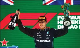  ?? ?? George Russell celebrates on the podium. Photograph: Chris Graythen/Getty Images