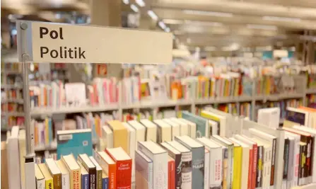  ?? — AFP photos ?? A shelf with political books is pictured at the library Tempelhof-Schoeneber­g in Berlin.