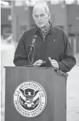  ?? DENIS POROY, AP ?? Secretary of Homeland Security John Kelly speaks at a news conference Feb. 10 in San Diego as vehicles enter the U. S. from Mexico.